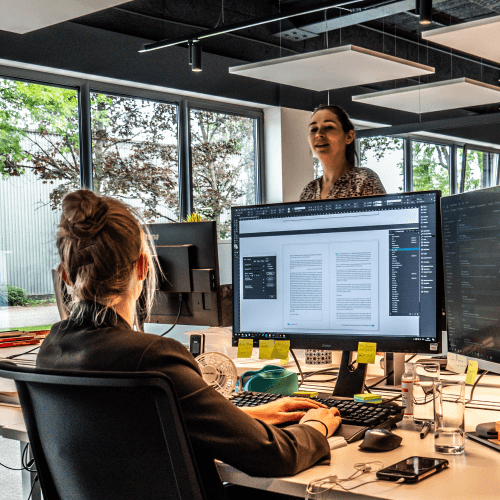 A typesetter composing pages in Adobe InDesign